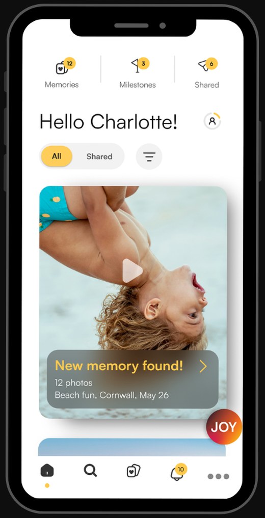 The Yoree home screen: a personal memory feed with a new memory found from a day at the beach
